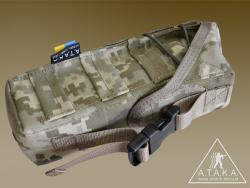 На боковых стенках подсумка дополнительные слоты MOLLE